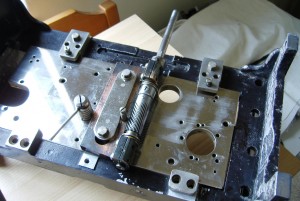 A trial assembly on the main plate, the two bolts fix the securing plate and the tension spring and securing bolt also now in place, also the spring peg