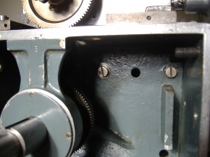 The securing screw are on the flywheel side and will be masked by the Flywheel